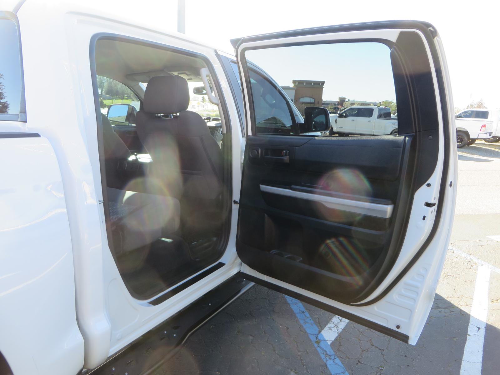 2020 White /GREY Toyota Tundra SR5 (5TFDY5F19LX) with an 5.7L engine, automatic transmission, located at 2630 Grass Valley Highway, Auburn, CA, 95603, (530) 508-5100, 38.937893, -121.095482 - Features - King Off Road adjustable remote reservoir coil overs, King 2.5 adjustable remote reservoir rear shocks, Method Race wheels, Falken Wildpeak tires, Sliders, Bed braces, Borla Exhaust, Husky floor mats, Window tint, and Ram phone mounts. - Photo #47